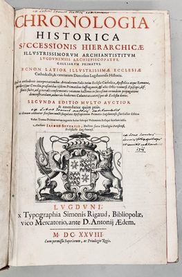 a book with a picture of a coat of arms on it