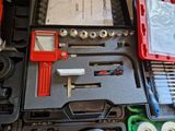 a tool kit that is sitting on top of a table