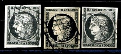 four different stamps of the same type are on a black background