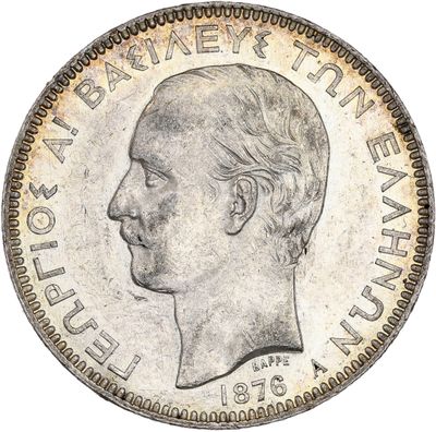 Gros plan sur une pièce de monnaie portant le visage d'un homme