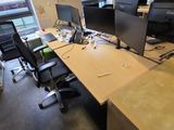 an image of a desk with two monitors and a keyboard