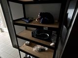 a shelf that has a bunch of items on it