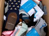 a box full of socks and a book in it