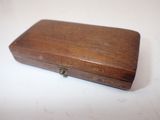 a small wooden box that is on a table