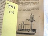 an open book with a picture of a science experiment on it