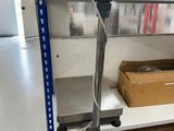a machine that is sitting on a shelf in a room