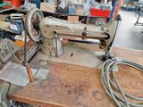 a sewing machine that is sitting on a table