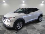 2020 nissan juke suv is shown in a showroom