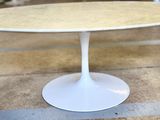 a white table with a marble top in a store