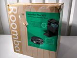 the box is open to show the contents of a coffee machine