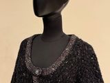 an image of a mannequin with a crown on it ' s head