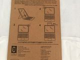 a cardboard box with a picture of a laptop inside of it