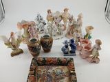 a lot of figurines that are sitting on a table