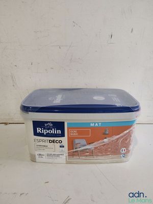 a plastic container with a lid on a table