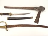 several different types of weapons are displayed on a white surface