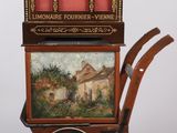 miniature de maison de poupée représentant une charrette avec une peinture à l'arrière