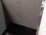 an image of a metal box with a door open
