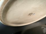 a close up of a bowl on a table