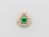 an emerald and diamond pendant