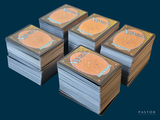a lot of cards that are stacked on top of each other