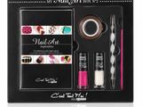 the nail art kit is in a black box with nail polish and nail brush