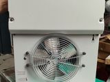 a fan that is sitting on top of a box