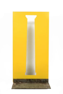 an image of a tall white pillar with a yellow background