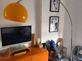 a television on a stand in a living room