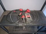 a table that has a bunch of wires on top of it