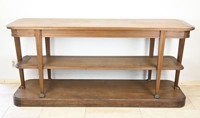 a wooden table with two shelves on top of it