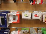 many different types of electronics on display in a store