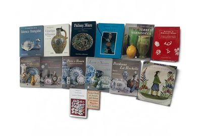 a lot of books that are sitting on a table