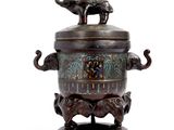 an image of a metal container with elephants on top of it