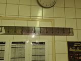 a clock that is on the wall above a window