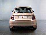 a car that is parked in a room with a white wall