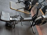 a machine that is sitting on the floor in the gym