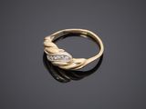 a gold and diamond ring