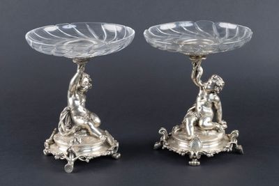 pair of antique silver plated candlesticks with cherensils