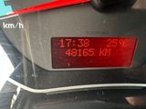 a digital clock on the back of a motorcycle