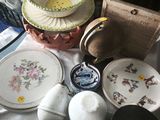 a table with a bunch of plates and bowls on it