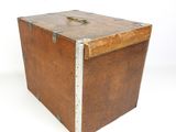 a wooden box with a metal latch on it