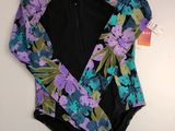 a bathing suit with purple and blue flowers on it