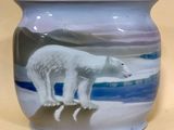 a vase with a picture of a polar bear on it