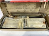 an open box with a bunch of items inside of it