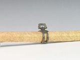 a close up of a samurai sword on a white surface