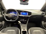 the interior of a car with a steering wheel, dashboard, and dashboard lights