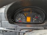 a close up of a car dashboard with a speedometer and gauges