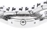 two watches are stacked on top of each other on a white surface