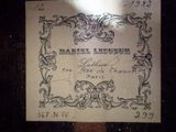 a label on a piece of paper with a picture of a man