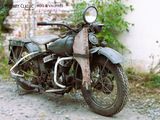 a motorcycle that is parked on the side of the road